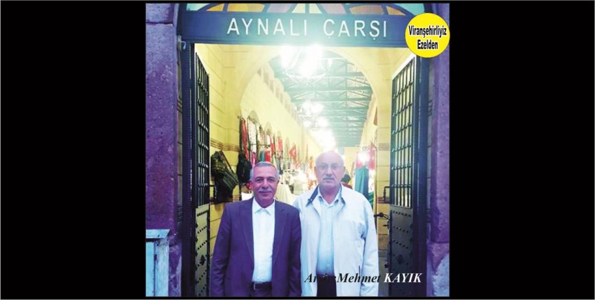 Viranşehir Giyimciler Esnaf Odası Başkanı Usta Terzi Mahmut Yılmaz ve Meslektaşı Mahmut Büyükçepik